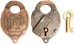 “I.R.N.C.” – “CLOSE THE LOCK TO GET KEY OUT”. Brass body. Brass shackle.