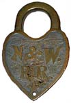“N.&W. R.R.”. Brass body. Brass shackle.