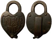 “N.&W. RY. Co.”. 4 1/8″ high x 2 5/8″ wide. Brass body. Brass shackle.