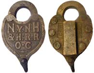 “N.Y.N.H&H.R.R O·C” – “CAR LOCK”. Brass body. Brass shackle.