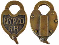“N.Y.P.AND.O. R.R”. 4 1/2″ high x 2 3/4″ wide x 1″ deep. Brass body. Brass shack