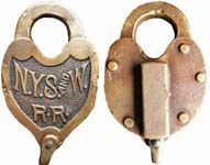 “N.Y.S.ANDW. R·R·”. Brass body. Brass shackle.