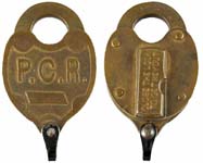 “P.C.R.” – “CLOSE THE LOCK TO GET KEY OUT”. Brass body. Brass shackle. “EJ BROOK