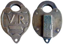“V. R.” – “CLOSE THE LOCK TO GET KEY OUT”. Brass body. Brass shackle. “EJ BROOKS