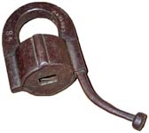 “P. EKLUND 85”. 4″ high excluding the tail. Iron body. Iron Shackle. “P. EKLUND