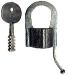 “R. KLINGVAL 59”. 5 1/2″ high including the tail. Iron body. Iron Shackle. “R. K