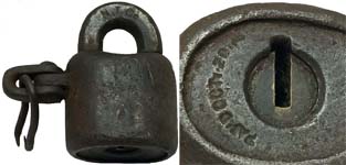 “N. T. Co.”. 2 1/4″ high. Steel body. Steel shackle.Patent #156113.