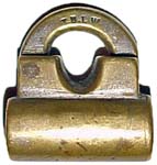 “T.B.L.W.”. 1 7/16″ high x 1 5/16″ wide. Brass body. Brass shackle.