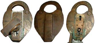 “U. S. B. I. R.” – Slaymaker. 3 7/8″ high x 2 1/2″ wide. Brass body. Brass shack