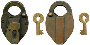 “U. S. B. I. R.”. 3 7/8″ high x 2 1/2″ wide. Brass body. Brass shackle. A paper