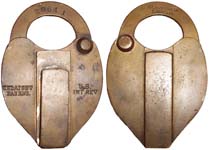 “U. S. INT REV”. 3 7/8″ high x 2 1/2″ wide. Brass body. Brass shackle. A paper s