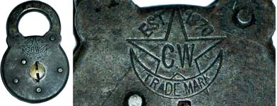 “C.W. TRADEMARK EST. 1870”. Stamped Steel body. Steel shackle. Flat split key.