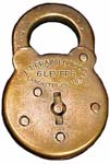 “E. T. FRAIM LOCK CO. 6 LEVERS LANCASTER, PA U. S. A.”. 3″ high x 2″ wide. Stamp