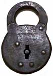 “M. W. CO. NEWHAVEN CT. U. S. A.” – Barrel Key. 1 7/8″ wide. Stamped Steel body.