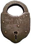 “M. W. CO. SIX LEVER”. 3 1/4″ high. Stamped Steel body. Steel shackle. The rever