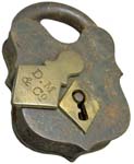 “D. M & Co”. 4 3/8″ high x 2 3/4″ wide. Iron body. Iron shackle. The reverse of