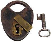 “D. M & Co”. 3 1/4″ high x 2 3/8″ wide. Iron body. Iron shackle. The reverse of