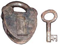 “H. Bellamy”. 5″ high x 3 1/2″ wide. Iron body. Iron shackle.