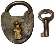 “L.F.B.”. 2 1/8″ high x 1 1/2″ wide. Iron body. Iron shackle. The dust guard is