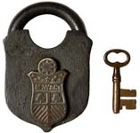 “M. W & Co”. 3 1/2″ high x 2 3/8″ wide x 1″ deep. Iron body. Iron shackle.