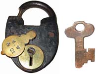 “M. W & Co”. 3 1/2″ high x 2 1/2″ wide. Iron body. Iron shackle.