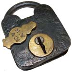 “M. W & Co”. 3″ high x 2 1/8″ wide. Iron body. Iron shackle.