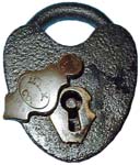 “N. L. M. CO.”. 3″ high. Iron body. Iron shackle.