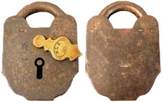 “N.L.M. CO.”. 3 5/8″ high x 2 1/2″ wide. Iron body. Iron shackle.