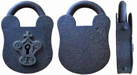 “U. S”. 4 3/8″ high. Iron body. Iron shackle. Brass bushing. Spring loaded shack