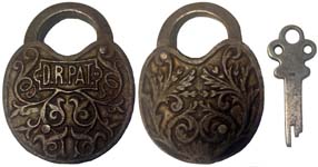 “D.R.PAT.” – Floral Design 2. 2 1/2″ high x 1 15/16″ wide. Steel body. Steel sha