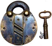 “H. C. JONES PATENT NEWARK N.J.” – Brass. 4″ high. Brass body. Brass shackle.Pat