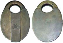 “J. NOCK PATENT PHILAD”. 3 3/4″ high x 2 3/4″ wide. Brass body. Brass shackle. T