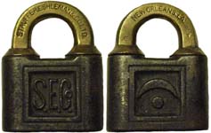 “S.E.Co.”. Steel body. Brass shackle. Keyway: Flat. “STAUFFER ESHLEMAN & CO LTD”