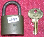 “B.E. CO.”. 2 1/2″ high x 1 1/2″ wide. Brass body. Steel shackle. Catalog #: 660