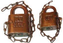 “N. Y. CITY” – “ISO”. 2 7/8″ high x 1 7/8″ wide. Brass body. Brass shackle.