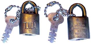 “T. W. A.”. 3/4″ wide. Brass body. Brass shackle. Catalog #: 618.