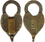 “U.S.”. 4 3/16″ high x 2 1/2″ wide x 3/4″ deep. Brass body. Brass shackle. Catal