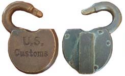 “U.S. CUSTOMS”. 2 1/2″ wide. Brass body. Brass shackle.