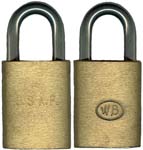 “U.S.A.F.” – “WB”. 3 5/8″ high x 1 3/4″ wide. Brass body. Steel shackle. Interch