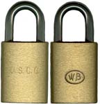 “U.S.C.G.” – “WB”. 3 5/8″ high x 2 3/4″ wide. Brass body. Steel shackle. 5 Pin T