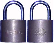 “U.S.M.C.”. Body Type: Solid. Body Material: Brass. Body Size: 1 1/2″Wx1 3/8″H.