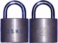 “U.S.M.C.”. Body Type: Solid. Body Material: Brass. Body Size: 1 3/4″Wx1 1/2″H.