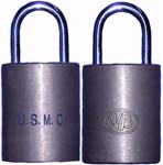 “U.S.M.C.”. Body Type: Solid. Body Material: Brass. Body Size: 1 3/4″Wx2 1/8″H.