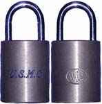 “U.S.M.C.”. Body Type: Solid. Body Material: Brass. Body Size: 1 3/4″Wx21/8″H. S